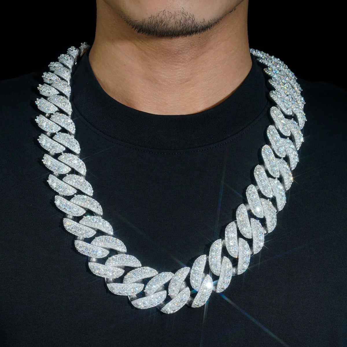 Man wearing an iced-out moissanite Miami Cuban link chain in 925 silver — CustomHipHop