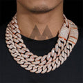 Man wearing 23mm mosaic-set moissanite Cuban link chain in 14K rose gold-plated finish