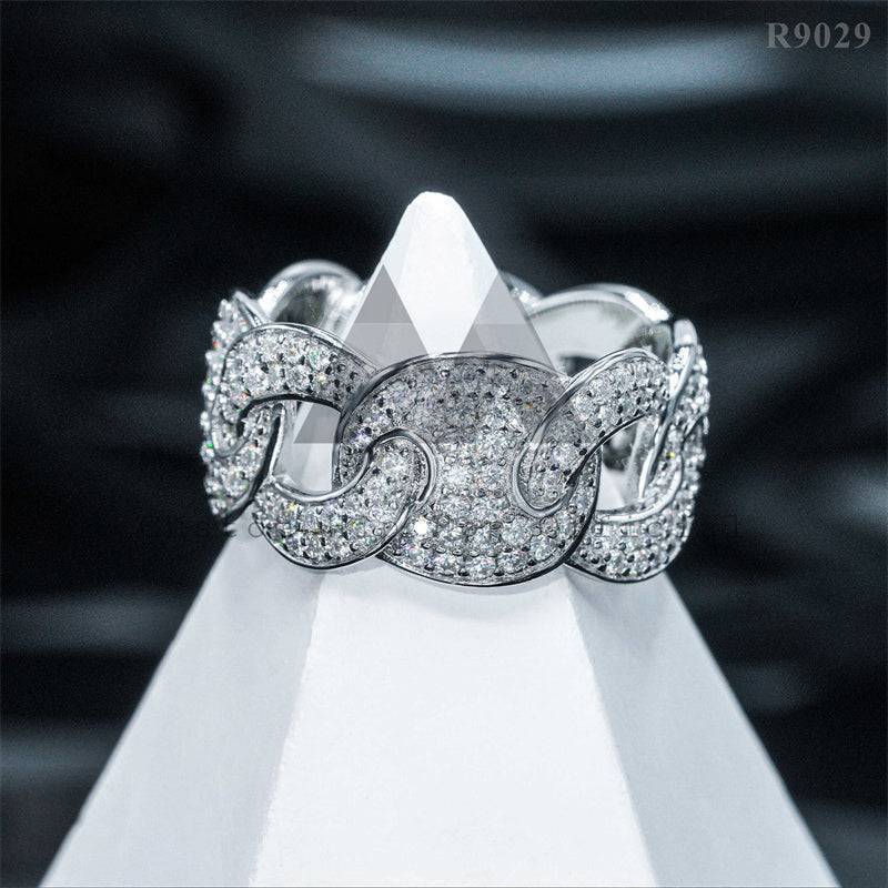 Silver ring with chain pattern and diamonds on pedestal, highlighting Hip Hop Jewelry