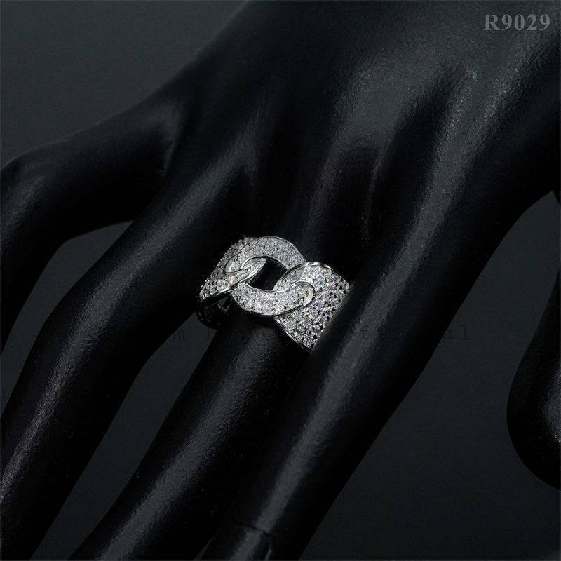 Hip Hop Jewelry: Intricate Hip Hop Ring with gemstones on mannequin hand