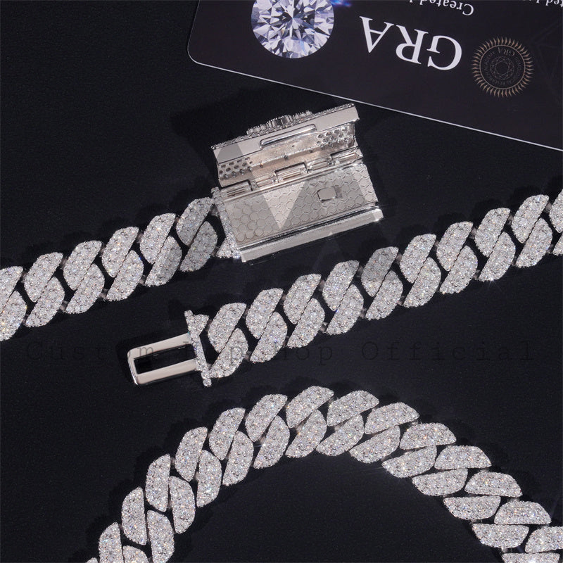 Custom made hip hop jewelry with iced logo lock on a 15MM Cuban link chain featuring VVS Moissanite