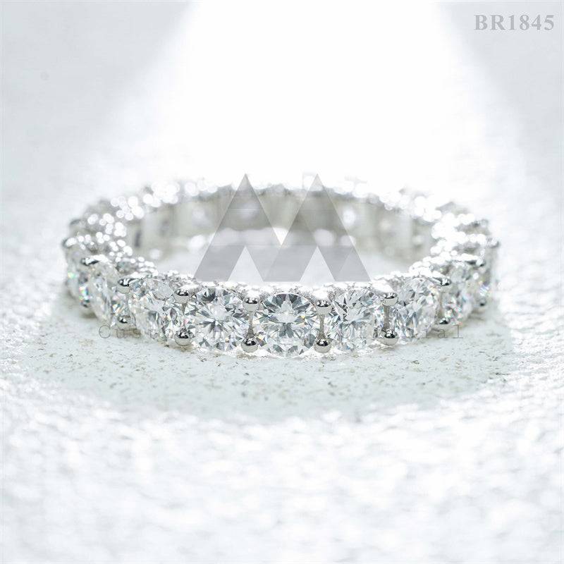 Hip hop jewelry featuring white gold plating over 925 silver with side iced 4mm moissanite eternity ring3