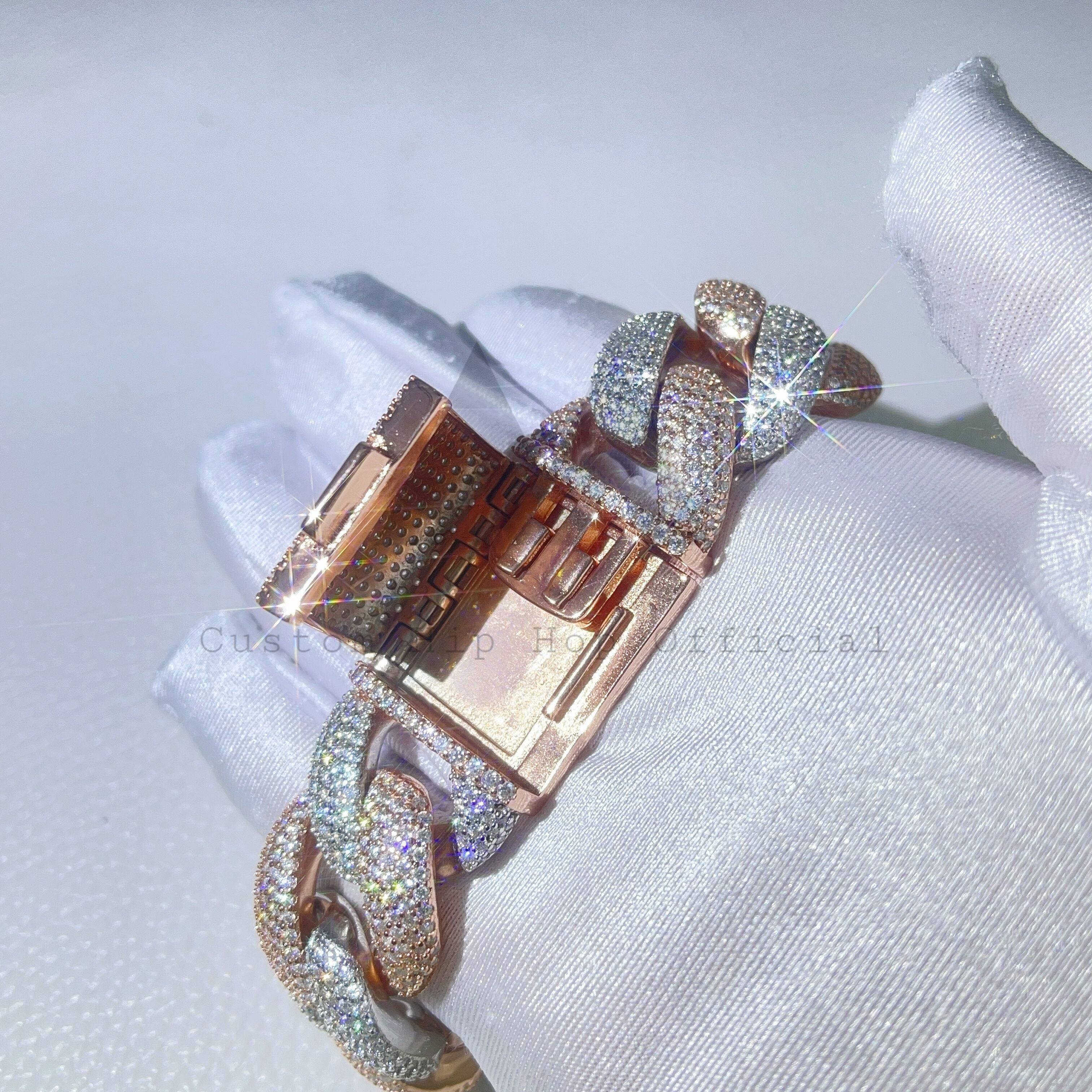 23MM Rose Gold Cuban Bracelet adorned with diamonds on a gloved hand, elegant design.