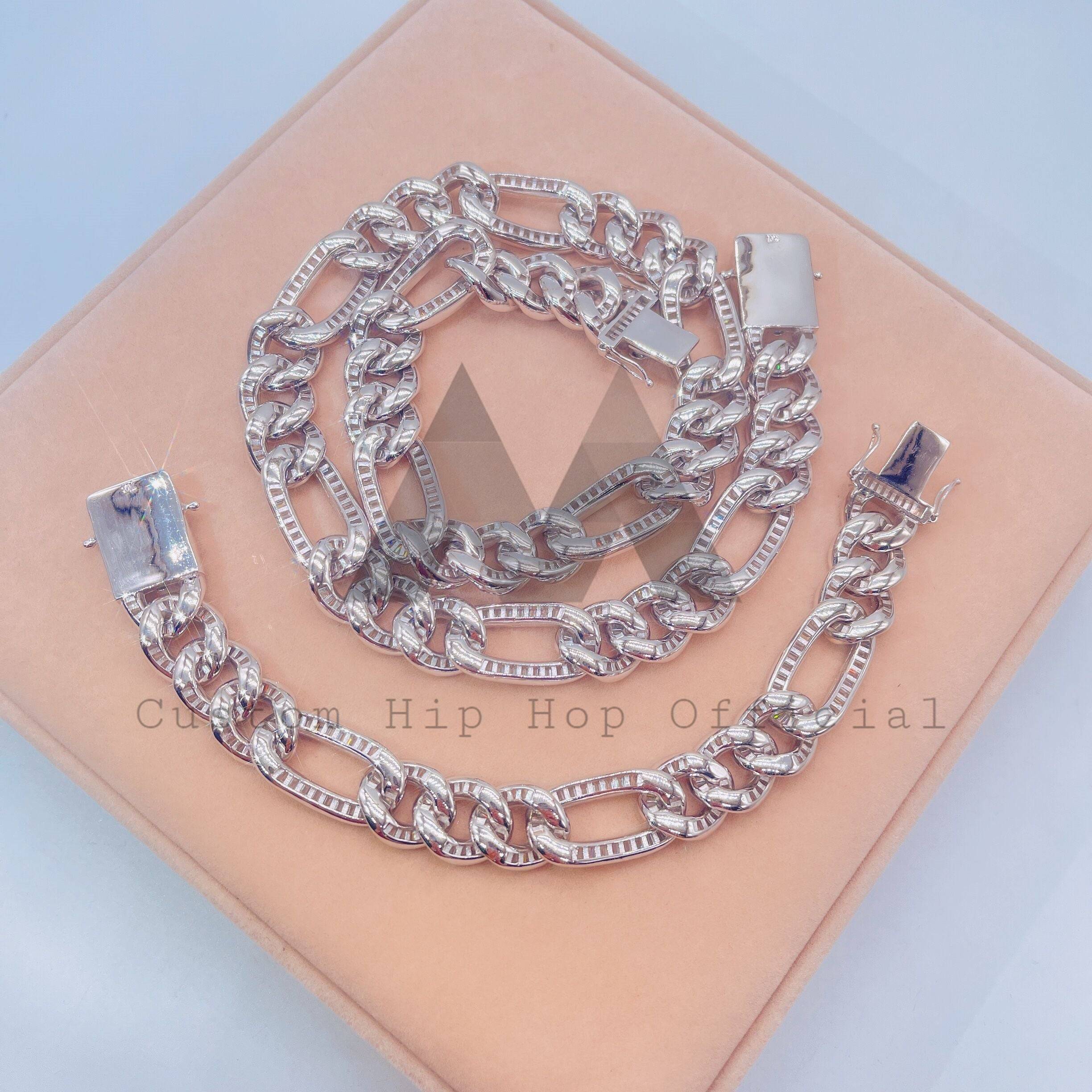 Hip hop jewelry featuring 15MM iced out Figaro chain with moissanite diamonds