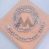 Hip hop jewelry featuring 15MM iced out Figaro chain with moissanite diamonds