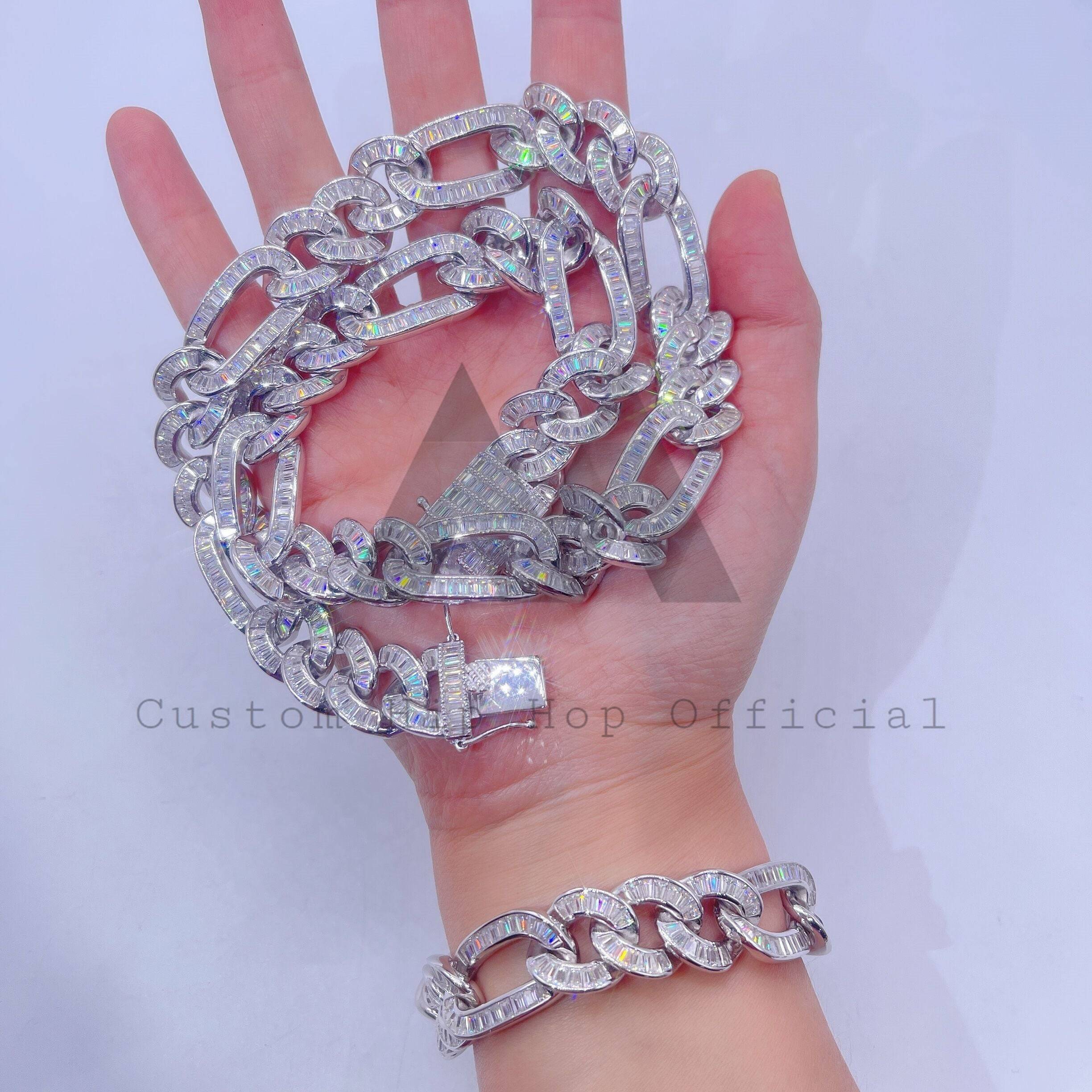 Hip hop jewelry featuring 15MM iced out Figaro chain with moissanite diamonds