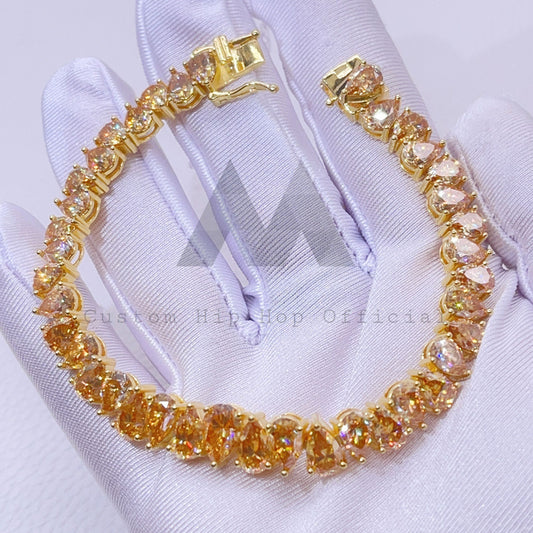 34.7 CT Pear Cut Mix Size Champagne Moissanite Tennis Bracelet with yellow gold plating