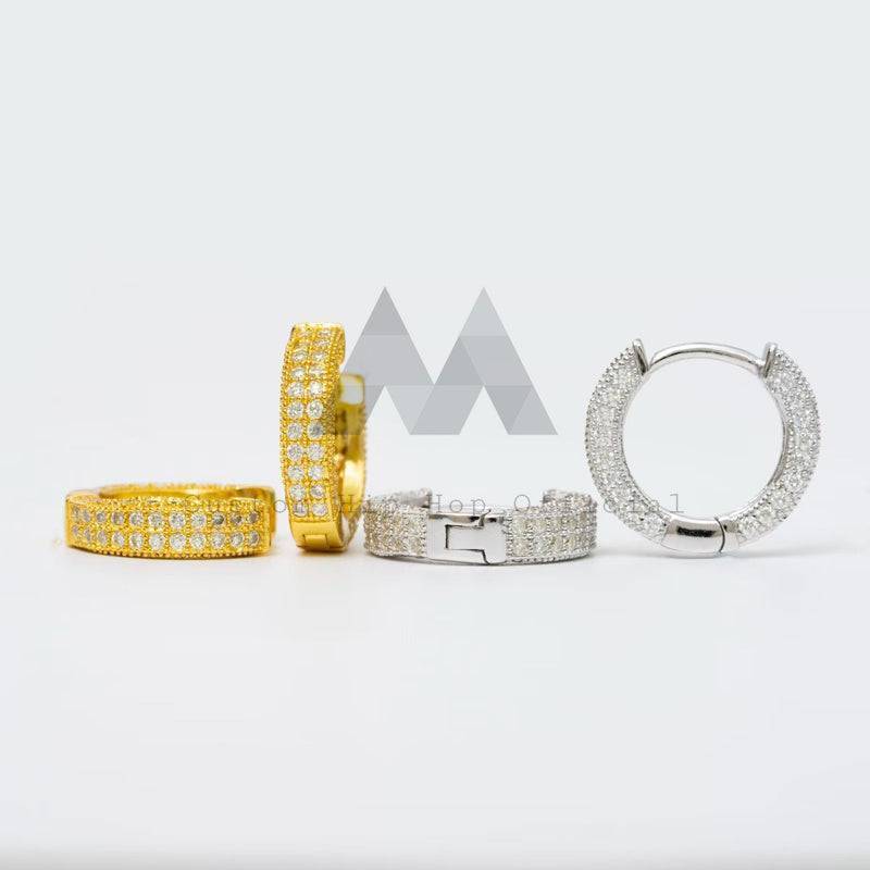 Luxury hip hop jewelry featuring moissanite diamond huggie earrings with iced out pave