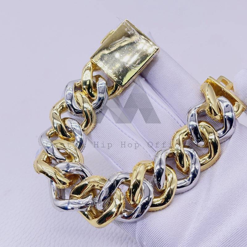 Hip hop jewelry featuring yellow gold two-tone 23mm thick heavy solid Cuban bracelet with VVS Moissanite1