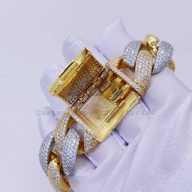 Hip hop jewelry featuring yellow gold two-tone 23mm thick heavy solid Cuban bracelet with VVS Moissanite3